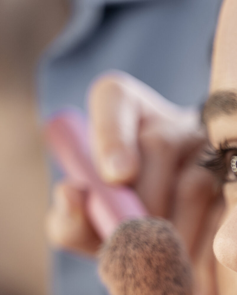 make-up-artist-getting-model-ready-photoshootin